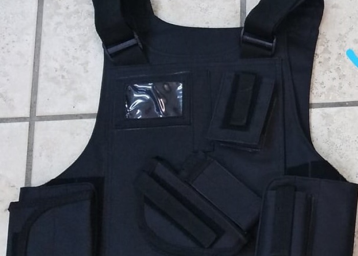 Tactical vest with holster for 2 armed plates